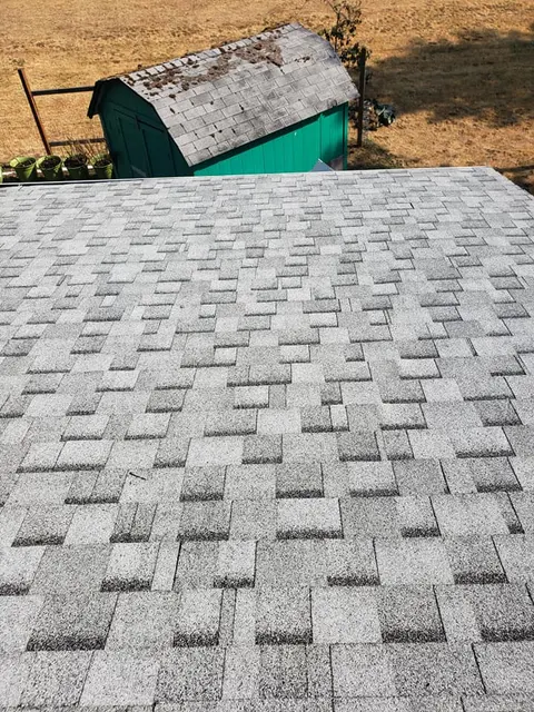 Completed gray asphalt shingle roof replacement by Ark Roofing in Tacoma, WA