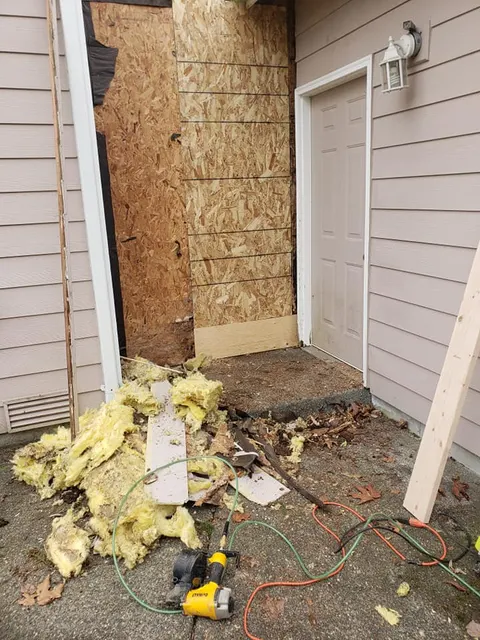 Exposed sheathing and insulation during siding project in Tacoma