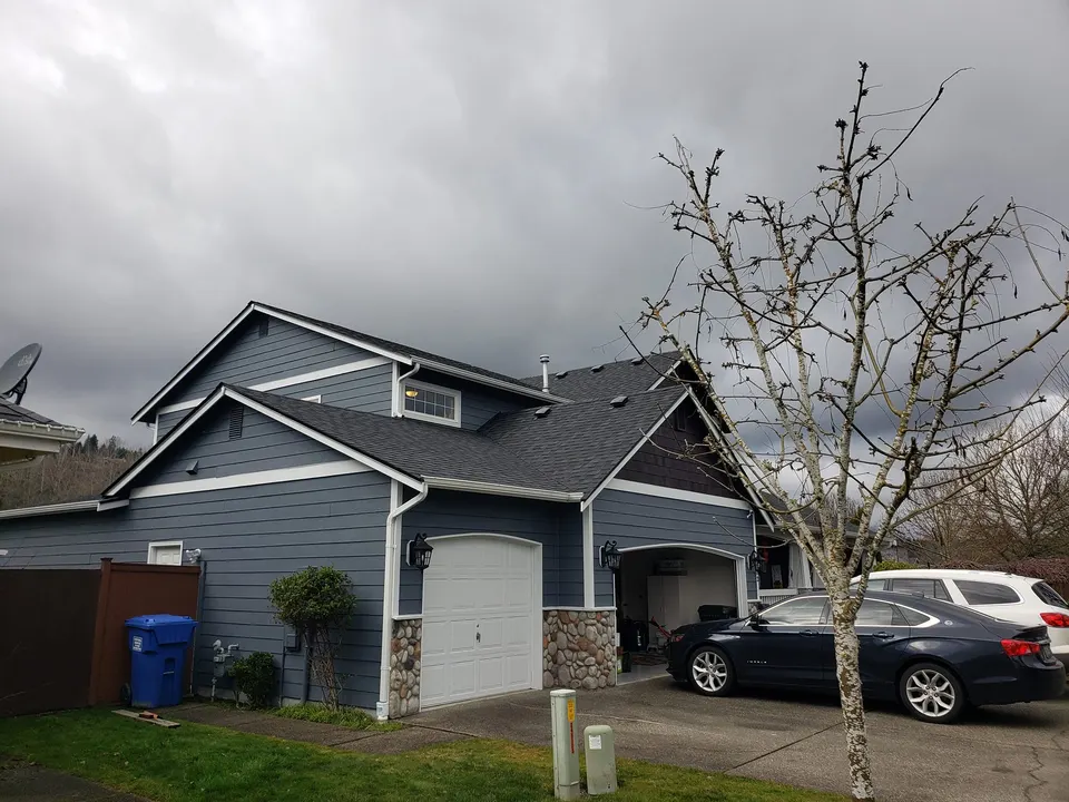 Home exterior with fence line in Tacoma, WA neighborhood